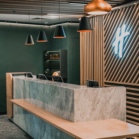 Holiday Inn Krakow City Centre By Ihg Exterior photo Reception desk at the hotel