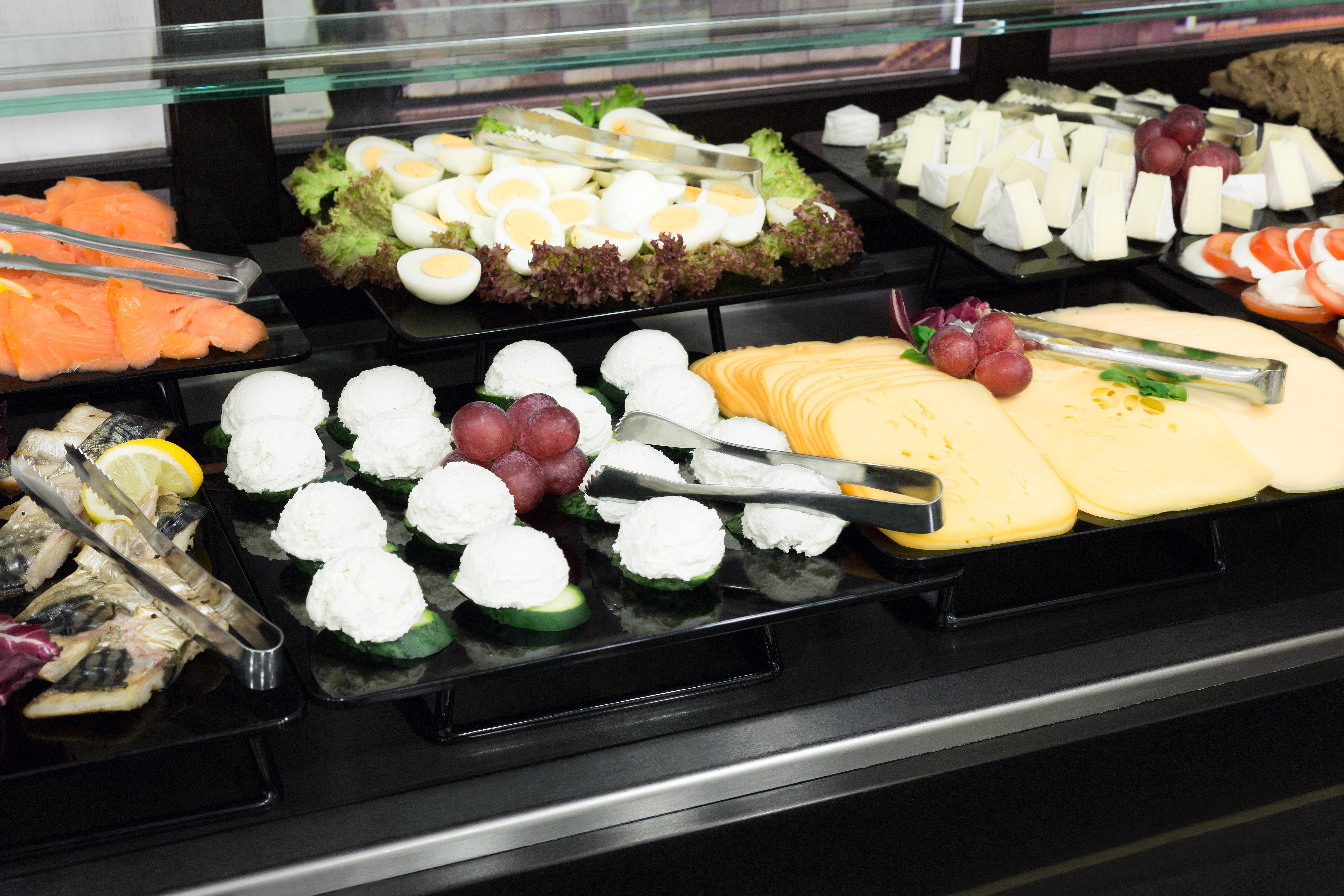 Holiday Inn Krakow City Centre By Ihg Exterior photo A buffet with a selection of cheeses