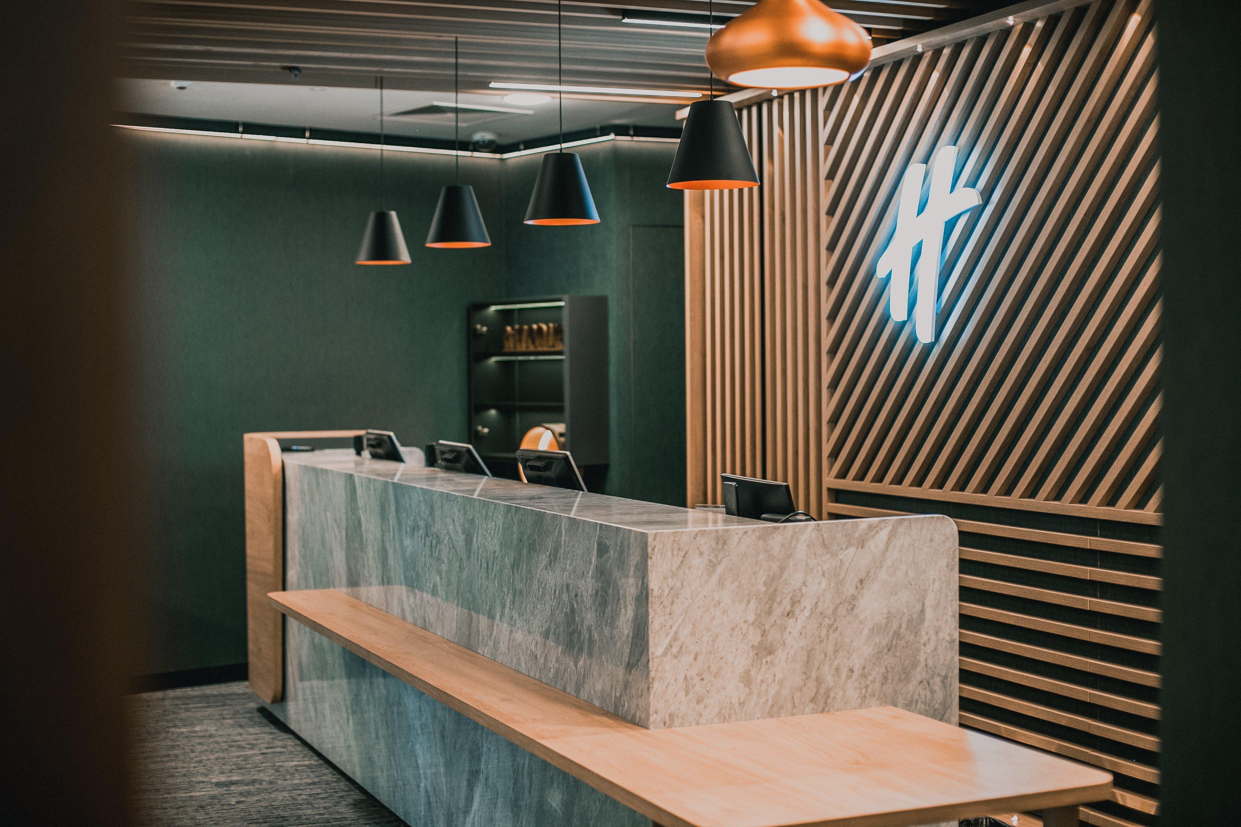 Holiday Inn Krakow City Centre By Ihg Exterior photo Reception desk at the hotel