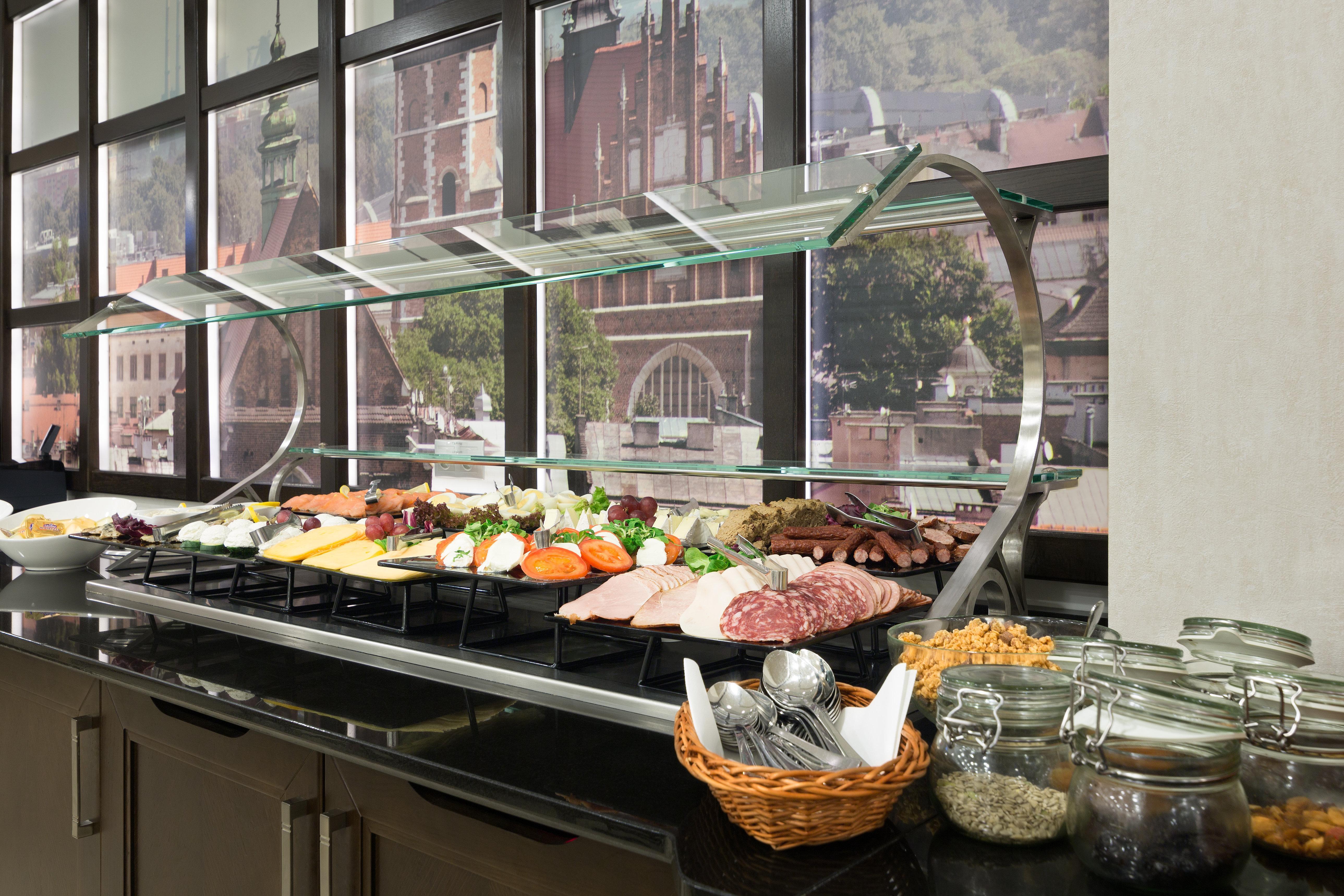 Holiday Inn Krakow City Centre By Ihg Exterior photo A buffet